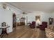 Living area featuring a floral print sofa and two armchairs at 8520 Imperial Cir, Palmetto, FL 34221