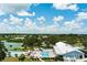 Community pool and clubhouse with surrounding landscape at 8520 Imperial Cir, Palmetto, FL 34221