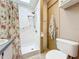 Bathroom with toilet, walk-in shower, and updated vanity at 3333 26Th E Ave # 1120, Bradenton, FL 34208