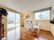 Bright dining area featuring a glass-top table surrounded by white chairs at 3333 26Th E Ave # 1120, Bradenton, FL 34208