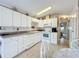 White kitchen with ample counter space and appliances at 3333 26Th E Ave # 1120, Bradenton, FL 34208