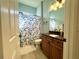 Clean bathroom with granite vanity and shower/tub combo at 7709 River Preserve Dr, Bradenton, FL 34212
