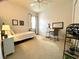 Bright bedroom with a twin bed, desk, and ample closet space at 7709 River Preserve Dr, Bradenton, FL 34212