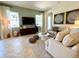 Spacious Gathering room with ample natural light and comfortable seating at 7709 River Preserve Dr, Bradenton, FL 34212