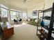 Cozy Gathering room features comfortable seating and large windows at 7709 River Preserve Dr, Bradenton, FL 34212