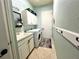 Convenient laundry room with washer, dryer, and storage cabinets at 7709 River Preserve Dr, Bradenton, FL 34212