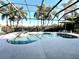 Inviting pool and spa area with a screened enclosure at 7709 River Preserve Dr, Bradenton, FL 34212
