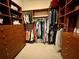 Large walk-in closet with ample shelving and hanging space at 7709 River Preserve Dr, Bradenton, FL 34212