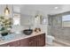 Elegant bathroom with a vessel sink and walk-in shower at 101 S Gulfstream Ave # 4F, Sarasota, FL 34236