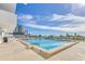 Community swimming pool with plenty of lounge chairs at 101 S Gulfstream Ave # 4F, Sarasota, FL 34236