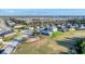 Aerial view showcases a community park, playground, and green space, enhancing neighborhood appeal at 10817 56Th St E, Parrish, FL 34219