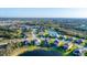 Community aerial view featuring single-Gathering homes, ponds, and lush landscaping at 10817 56Th St E, Parrish, FL 34219