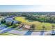 Aerial view showcases a community park, playground, and green space, enhancing neighborhood appeal at 10817 56Th St E, Parrish, FL 34219