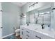 Stylish bathroom features a double vanity, decorative lighting, and a sleek design at 10817 56Th St E, Parrish, FL 34219