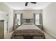 Bright bedroom featuring a ceiling fan and neutral color palette at 10931 Blue Magnolia Ln, Parrish, FL 34219