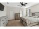 Main bedroom with king-size bed and plenty of closet space at 10931 Blue Magnolia Ln, Parrish, FL 34219