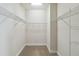 Large walk-in closet with wire shelving for convenient storage at 10931 Blue Magnolia Ln, Parrish, FL 34219