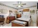 Bedroom with a ceiling fan and a window at 1119 76Th Nw St, Bradenton, FL 34209