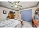 Spacious bedroom with double bed and lavender doors at 1119 76Th Nw St, Bradenton, FL 34209