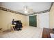 Well-lit bedroom with double doors and wood desk at 1119 76Th Nw St, Bradenton, FL 34209