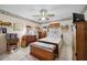 Bedroom with a ceiling fan and a window at 1119 76Th Nw St, Bradenton, FL 34209