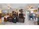 Spacious living room with tile flooring, ceiling fans, and neutral walls creating a bright atmosphere at 1119 76Th Nw St, Bradenton, FL 34209