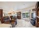 Living room with leather recliners, and view of kitchen at 1119 76Th Nw St, Bradenton, FL 34209