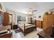 Bright main bedroom featuring tile flooring and a ceiling fan at 1119 76Th Nw St, Bradenton, FL 34209