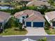 Aerial view of house, showcasing landscaping and location at 116 Daylily Blvd, Nokomis, FL 34275