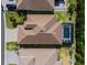 Aerial view of house and backyard pool at 116 Daylily Blvd, Nokomis, FL 34275