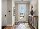 Light-filled entryway showcasing a modern console table and view to backyard at 116 Daylily Blvd, Nokomis, FL 34275