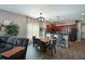 Modern kitchen with an island and adjacent dining area at 11924 Forest Park Cir, Lakewood Ranch, FL 34211