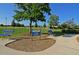 Community park with benches and grassy areas at 11924 Forest Park Cir, Bradenton, FL 34211