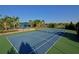 Well-maintained tennis court in a residential community at 11924 Forest Park Cir, Lakewood Ranch, FL 34211