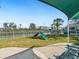 Dog park with shade and seating at 12310 Halfmoon Lake Ter, Bradenton, FL 34211