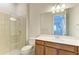 Clean bathroom with a walk-in shower and modern vanity at 16446 Slate Pl, Bradenton, FL 34211