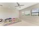 Bedroom with a full-size bed and ceiling fan at 16446 Slate Pl, Bradenton, FL 34211