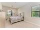 Cozy bedroom with a queen-size bed and ample closet space at 16446 Slate Pl, Bradenton, FL 34211