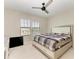 Spacious bedroom with large windows and ceiling fan at 16446 Slate Pl, Bradenton, FL 34211