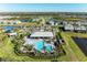 Resort-style pool with expansive sundeck and clubhouse at 16446 Slate Pl, Bradenton, FL 34211