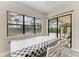 Dining room with table and chairs and view of the pool through sliding glass doors at 16446 Slate Pl, Bradenton, FL 34211