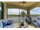 Relaxing screened balcony overlooking a lake and golf course at 16904 Vardon Ter # 405, Bradenton, FL 34211