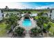 Resort-style pool with a relaxing gazebo and lush landscaping at 16904 Vardon Ter # 405, Bradenton, FL 34211