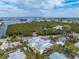 Aerial view of a waterfront property, showcasing its location and surrounding neighborhood at 220 82Nd St, Holmes Beach, FL 34217