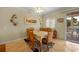 Casual dining area with table and chairs near the balcony at 220 82Nd St, Holmes Beach, FL 34217