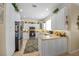 Well-equipped kitchen offering ample counter space and white cabinetry at 220 82Nd St, Holmes Beach, FL 34217