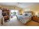 Large main bedroom with king-size bed and private balcony access at 220 82Nd St, Holmes Beach, FL 34217