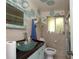 Charming bathroom with unique sink and decor at 2311 Roselawn Cir, Sarasota, FL 34231