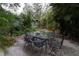 Outdoor patio with table and chairs at 2311 Roselawn Cir, Sarasota, FL 34231