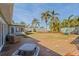 Large backyard with patio and grassy area at 2329 Outer Dr, Sarasota, FL 34231